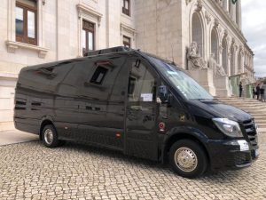 amiroad bus next to portuguese parliament