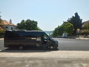 embassy transportations mini bus on the street