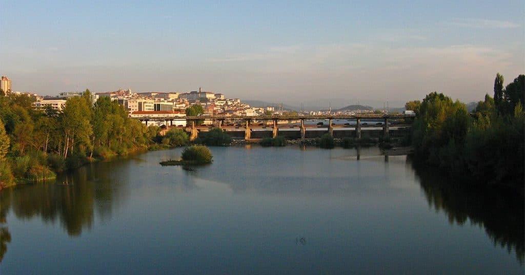 Panoramic view of Coimbra and the University hill from across the Mondego river, Portugal