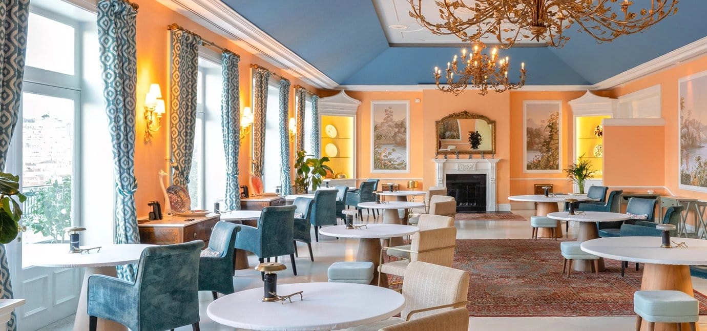 The blue-ceilinged, peach-walled dining room at The Yeatman hotel in Vila Nova de Gaia, home to a two-Michelin-star restaurant